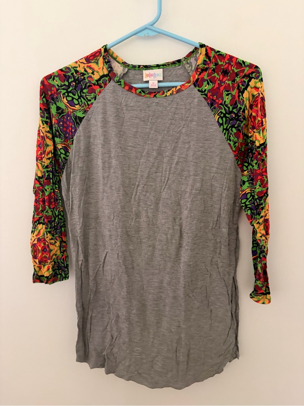 LuLaRoe Gray Raglan Top with Multicolor Floral Raglan Sleeves